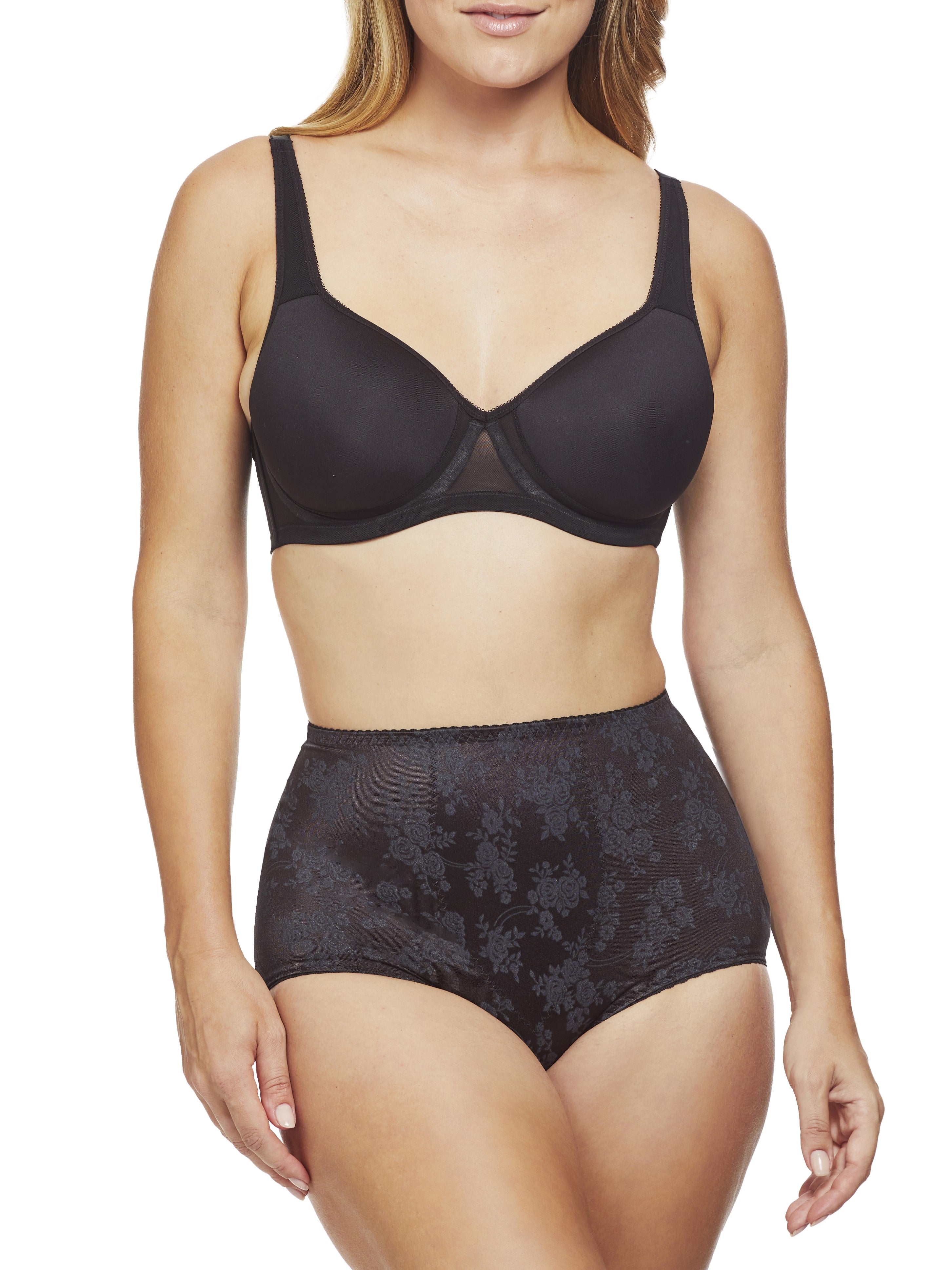 a woman wearing black tummy control underwear shapewear