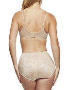 a woman wearing nude tummy control underwear shapewear