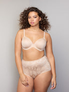 a woman wearing nude tummy control underwear shapewear
