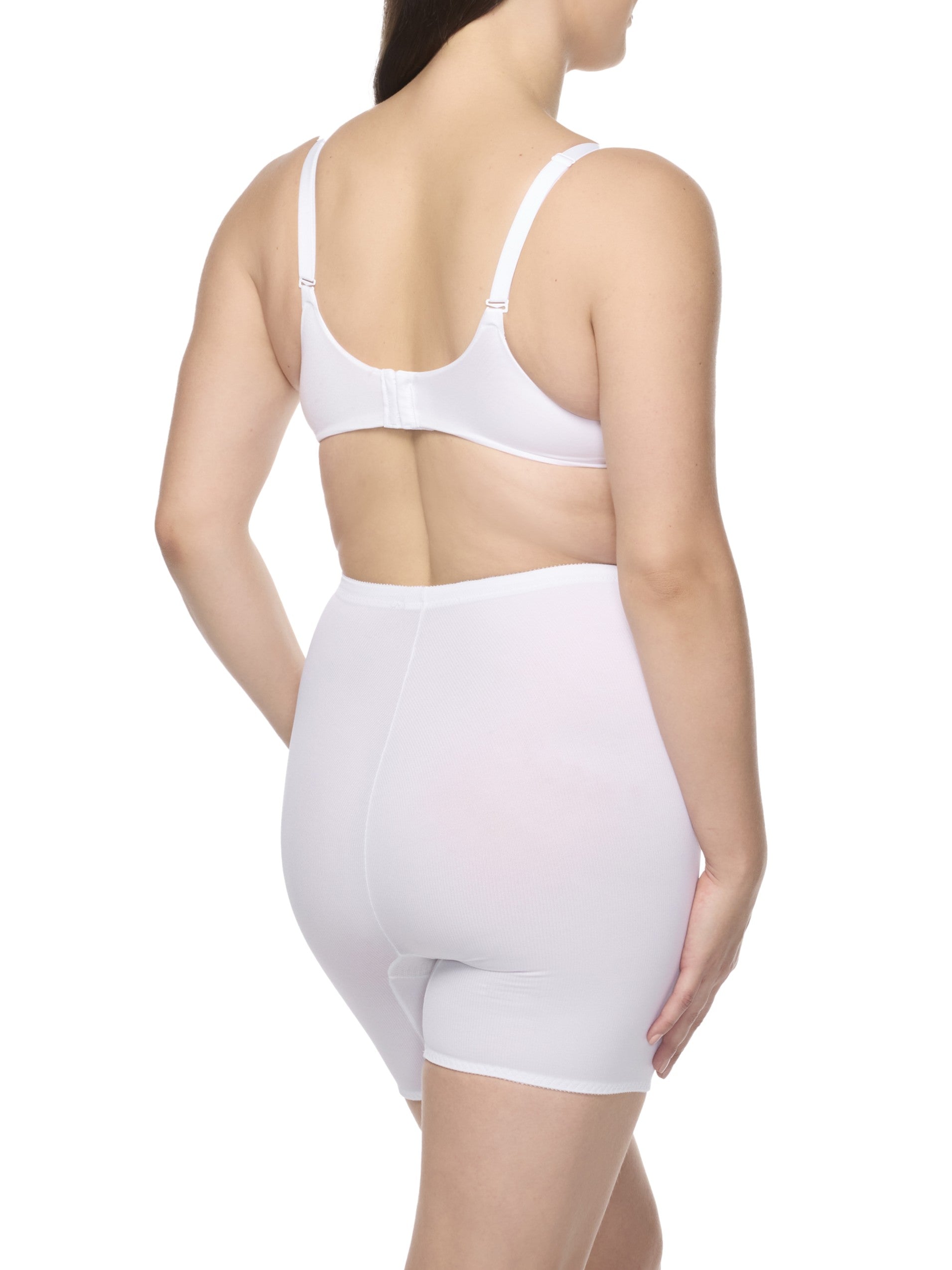 a woman wearing a white tummy control body shaper short shapewear