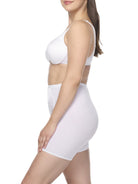 a woman wearing a white tummy control body shaper short shapewear