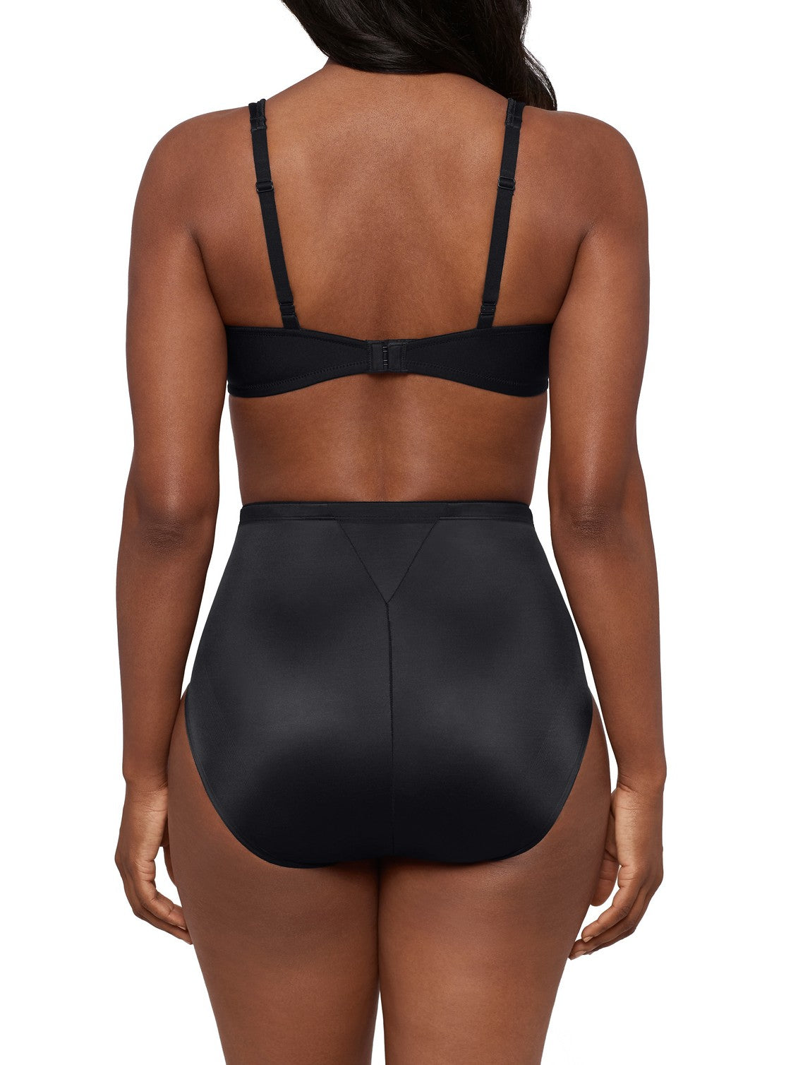 woman wearing a black bra and black shaping brief