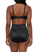 woman wearing a black bra and black shaping brief