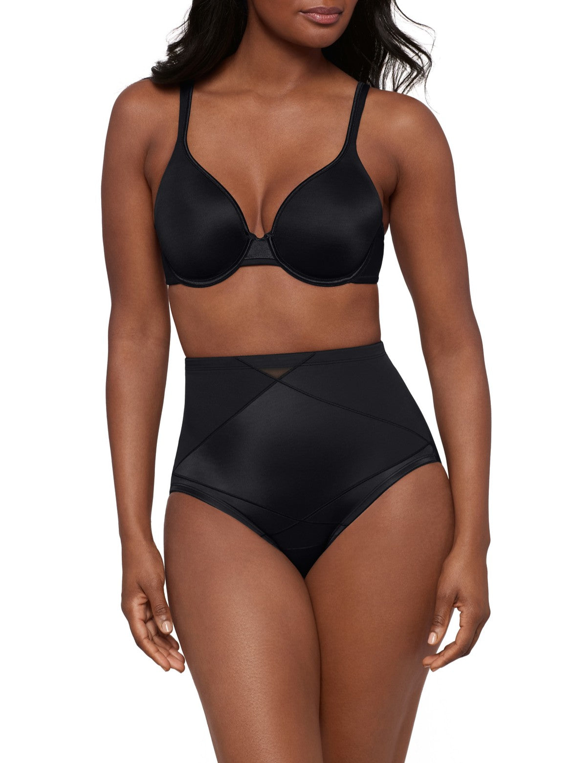 woman wearing a black bra and black shaping brief