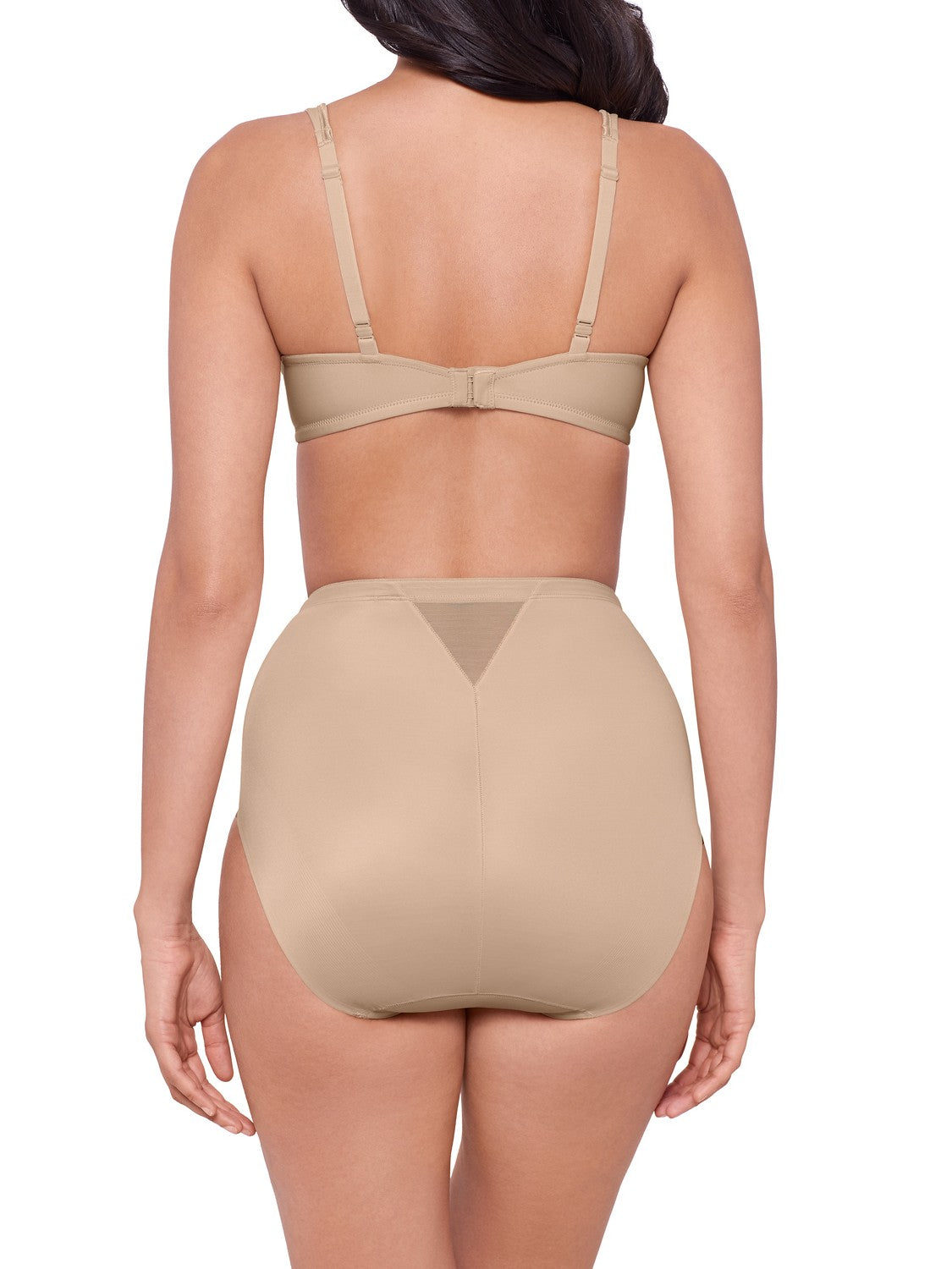 woman wearing a beige bra and beige shaping brief