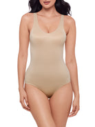 a woman wearing a nude shaping bodysuit body shaper