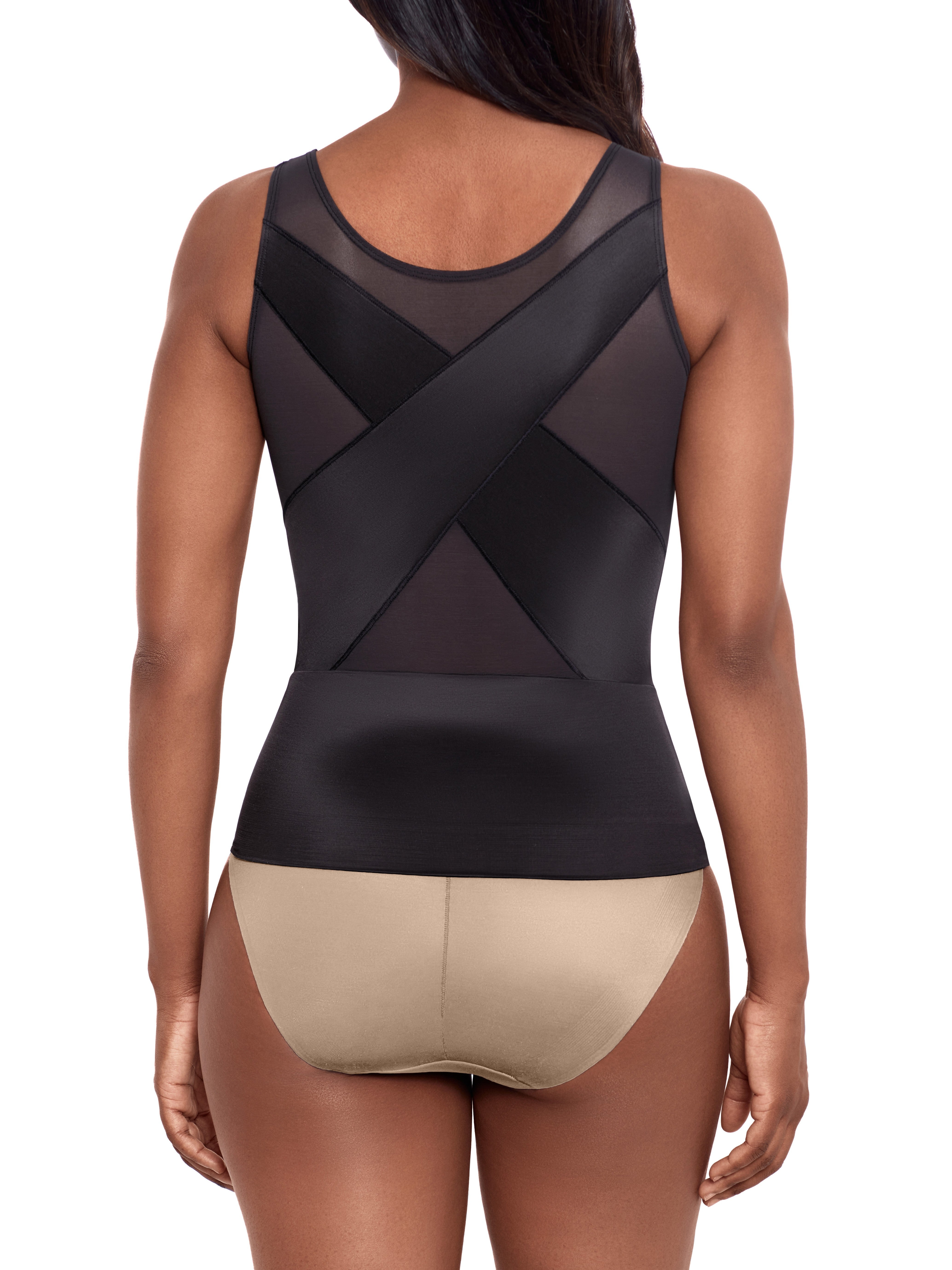 a woman wearing a black back smoothing tummy control cami shapewear