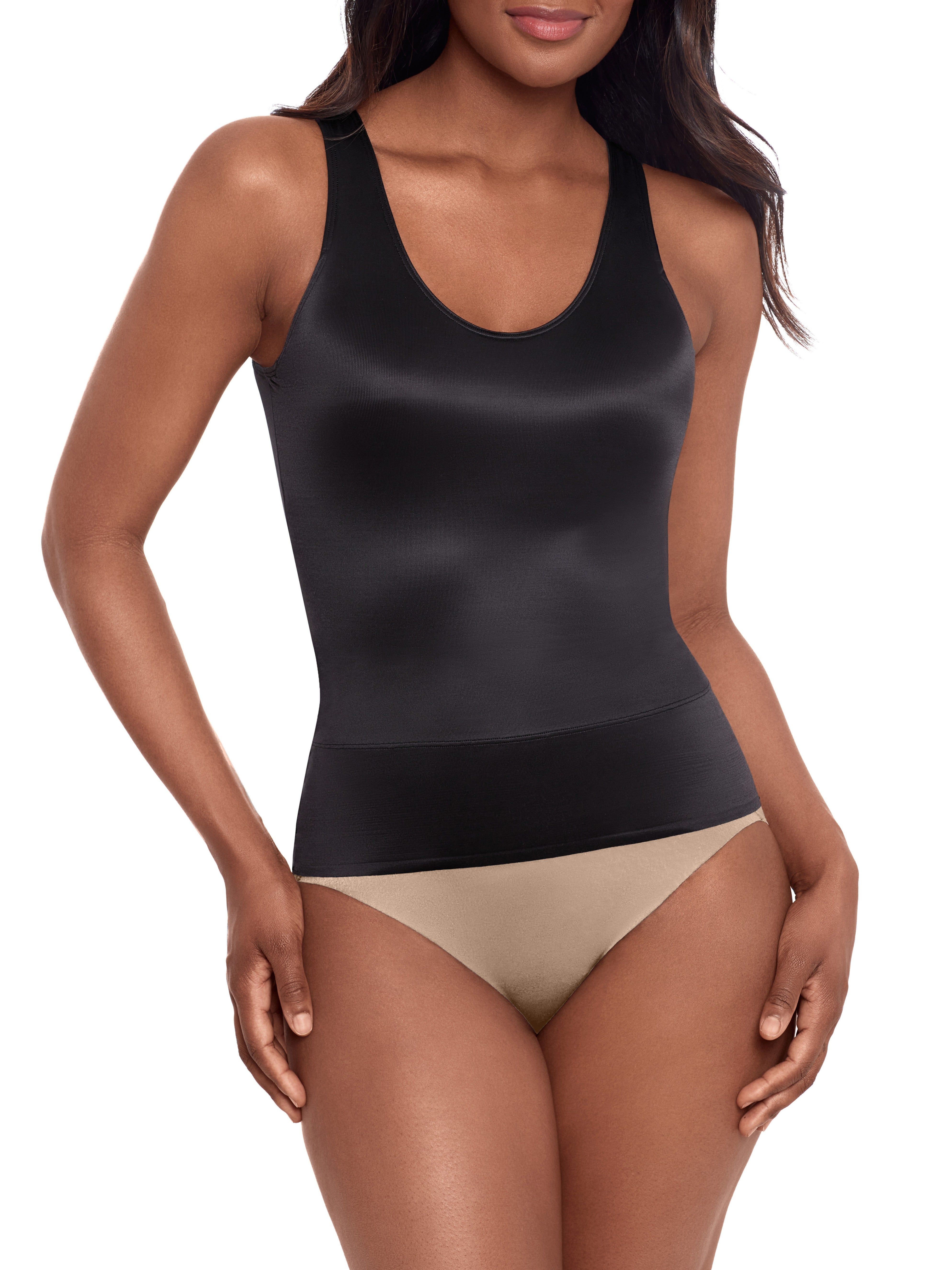 a woman wearing a black back smoothing tummy control cami shapewear