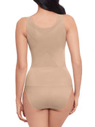 a woman wearing a nude back smoothing tummy control cami shapewear