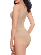 a woman wearing a nude back smoothing tummy control cami shapewear