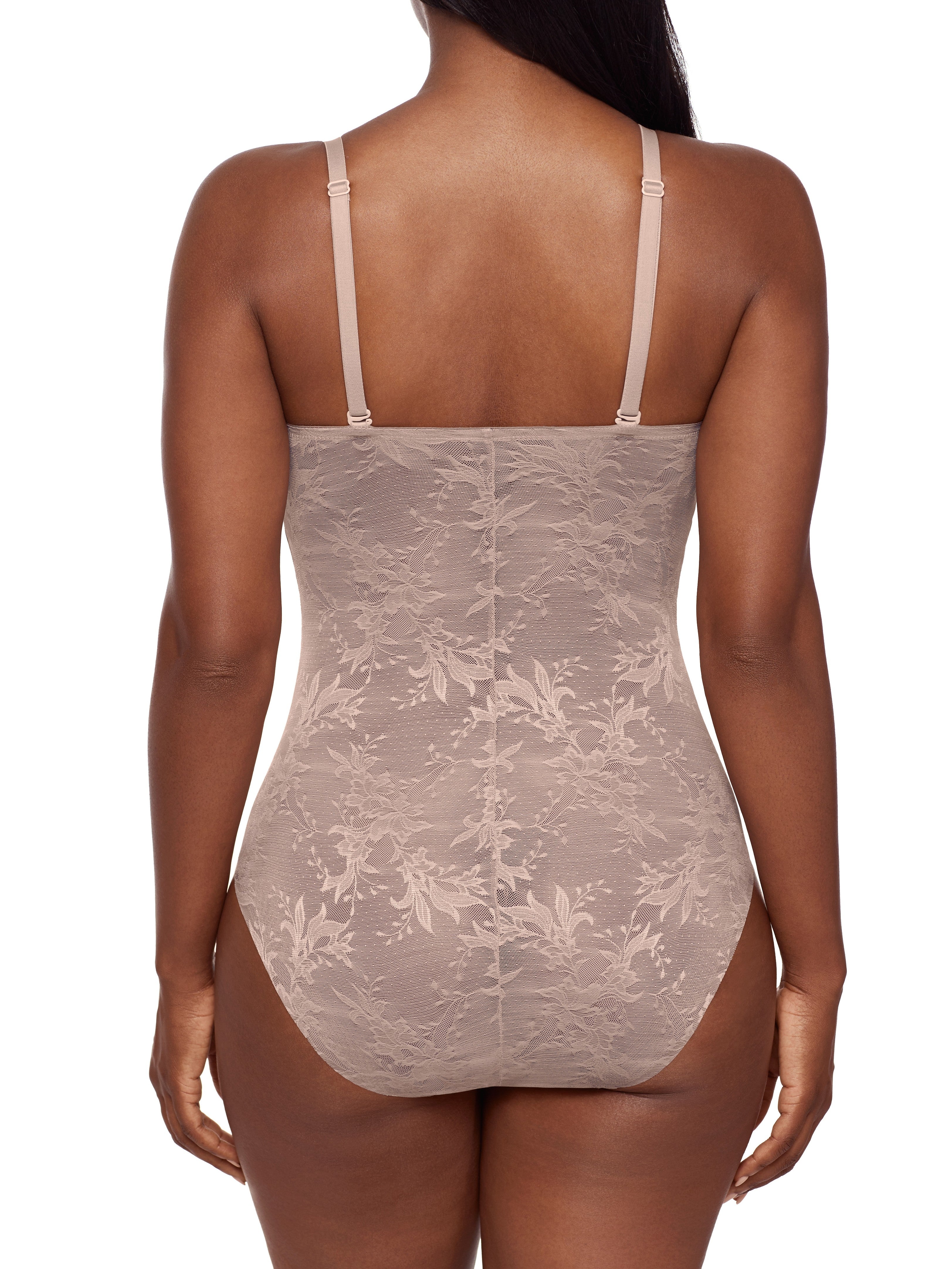 Lace bodysuit worn by a model on a white background