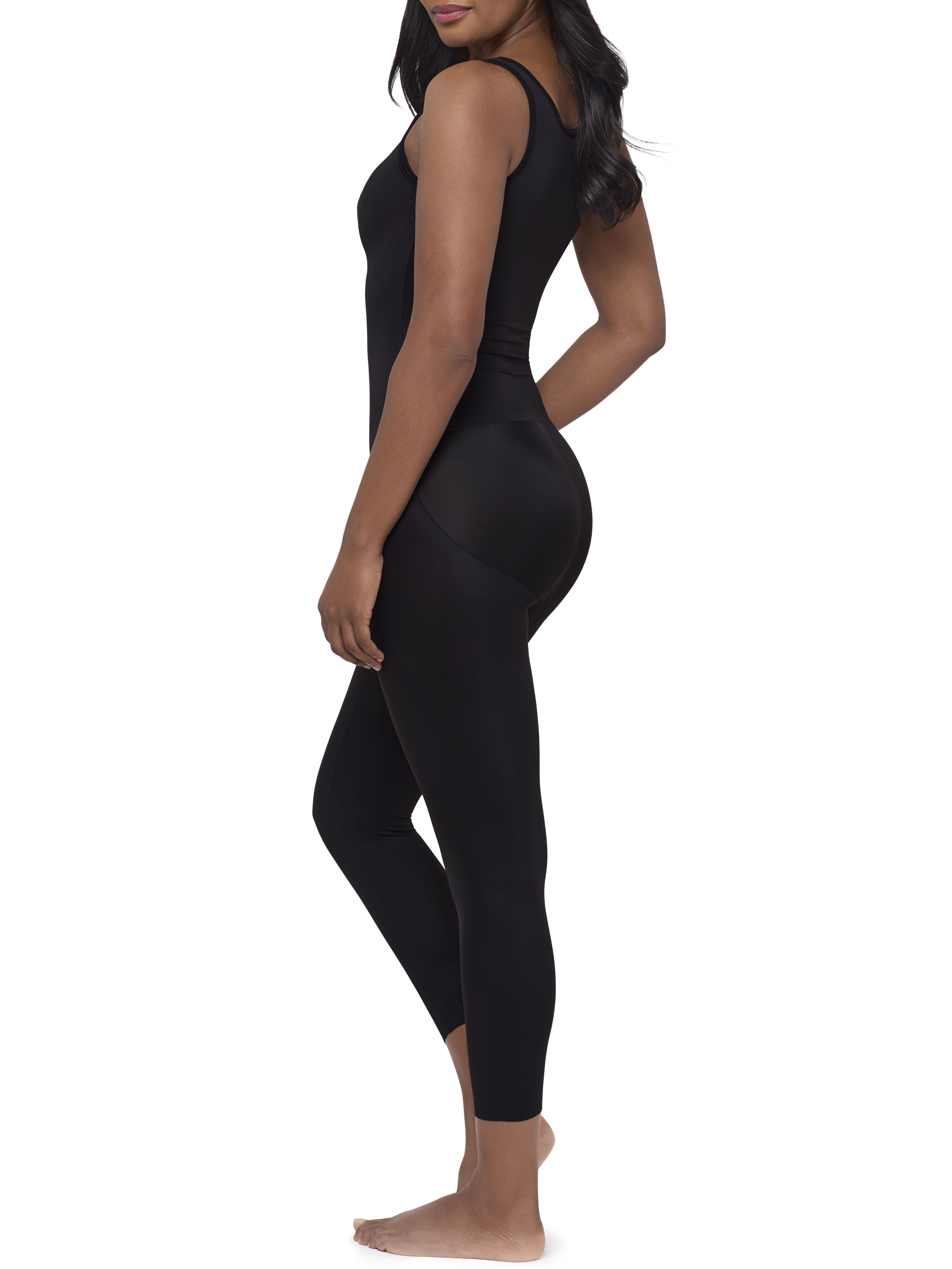 A woman modeling a full-body black shaper bodysuit or against a plain white background.