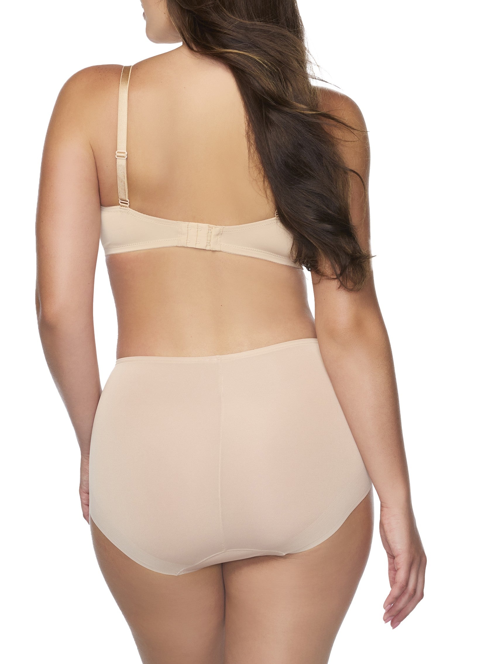 woman wearing a beige bra and shaping brief