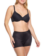 a woman wearing black tummy control underwear shorts shapewear