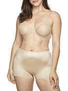 a woman wearing nude tummy control underwear shorts shapewear