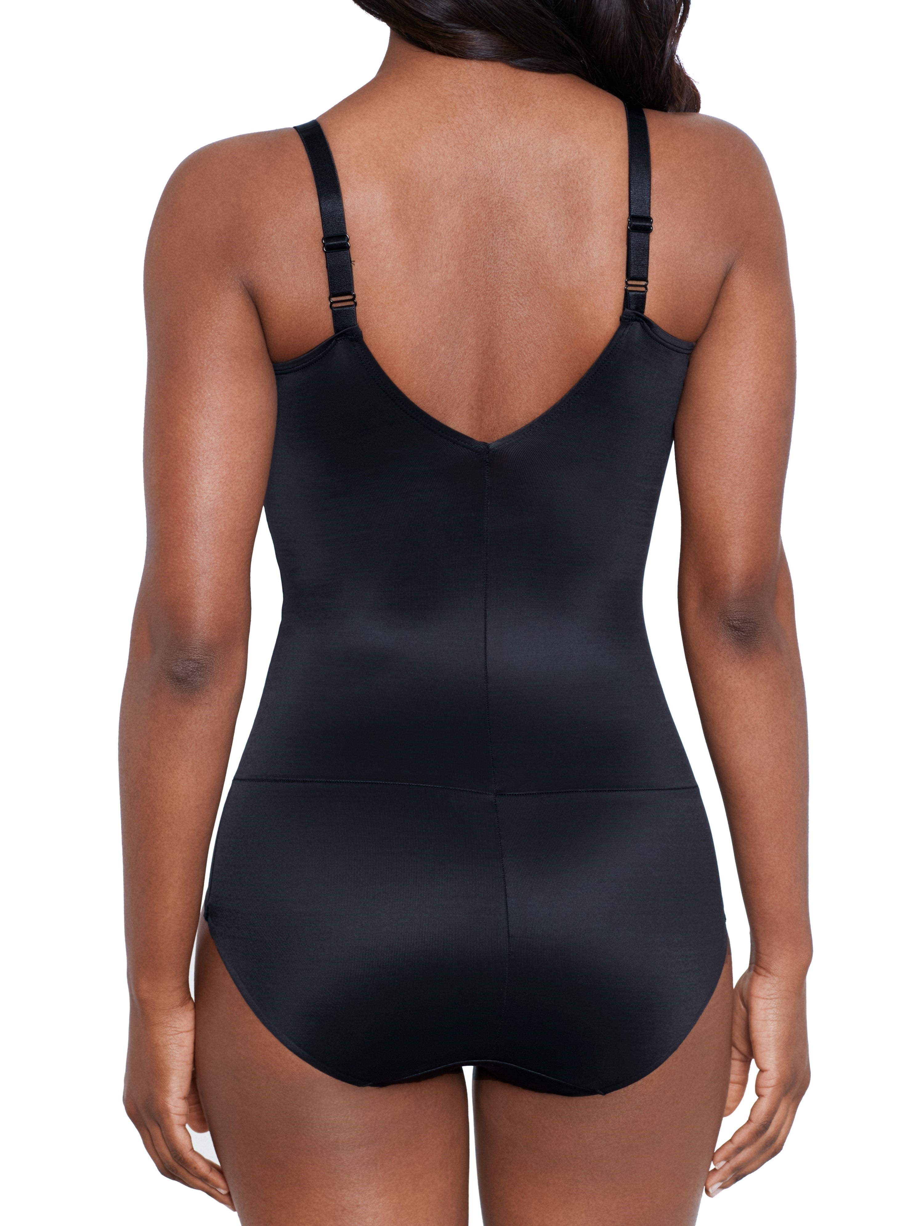 a woman wearing a black shaping bodysuit shapewear