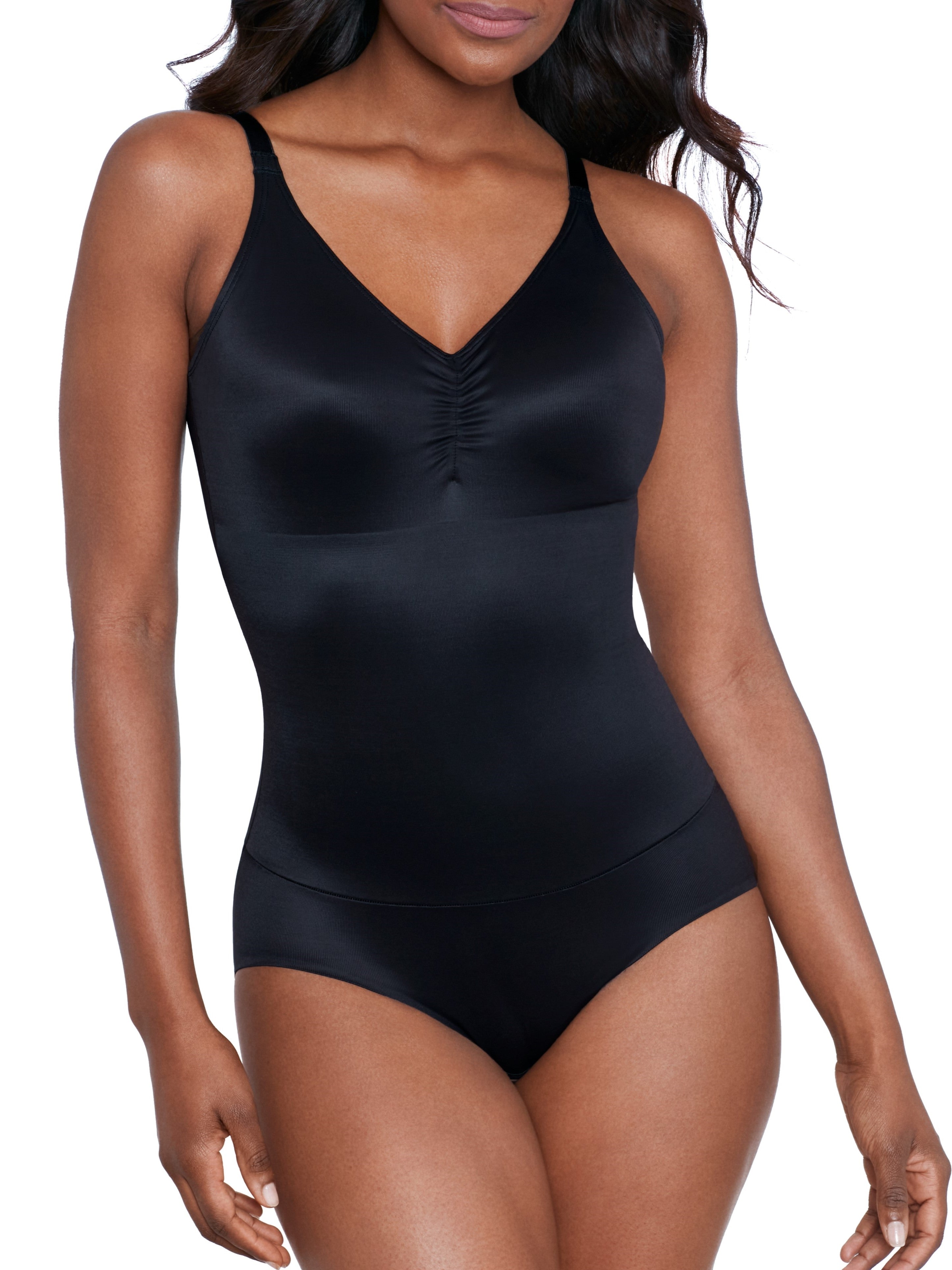 a woman wearing a black shaping bodysuit shapewear