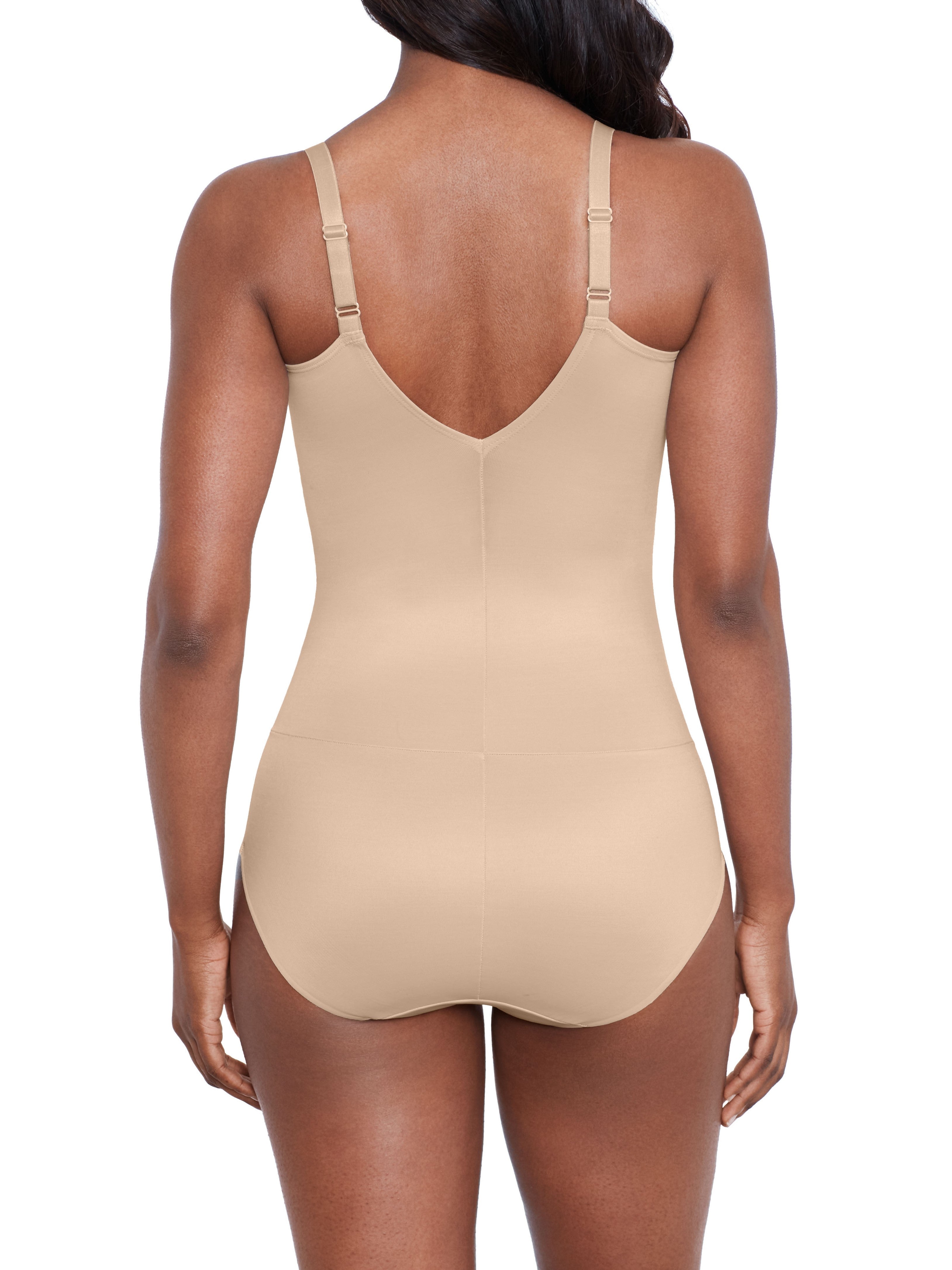 a woman wearing a nude shaping bodysuit shapewear