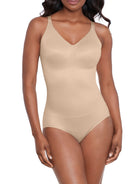 a woman wearing a nude shaping bodysuit shapewear