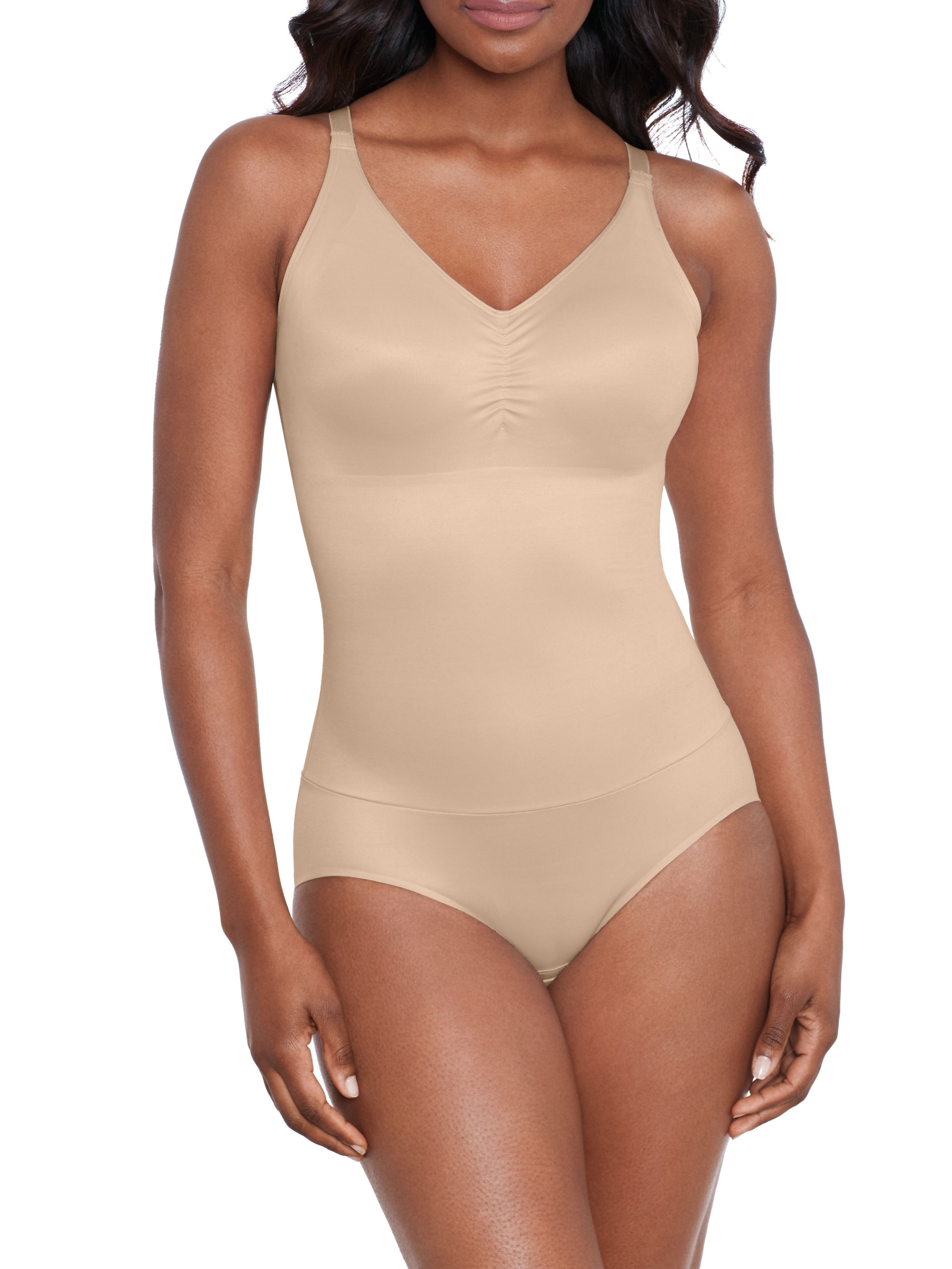 a woman wearing a nude shaping bodysuit shapewear