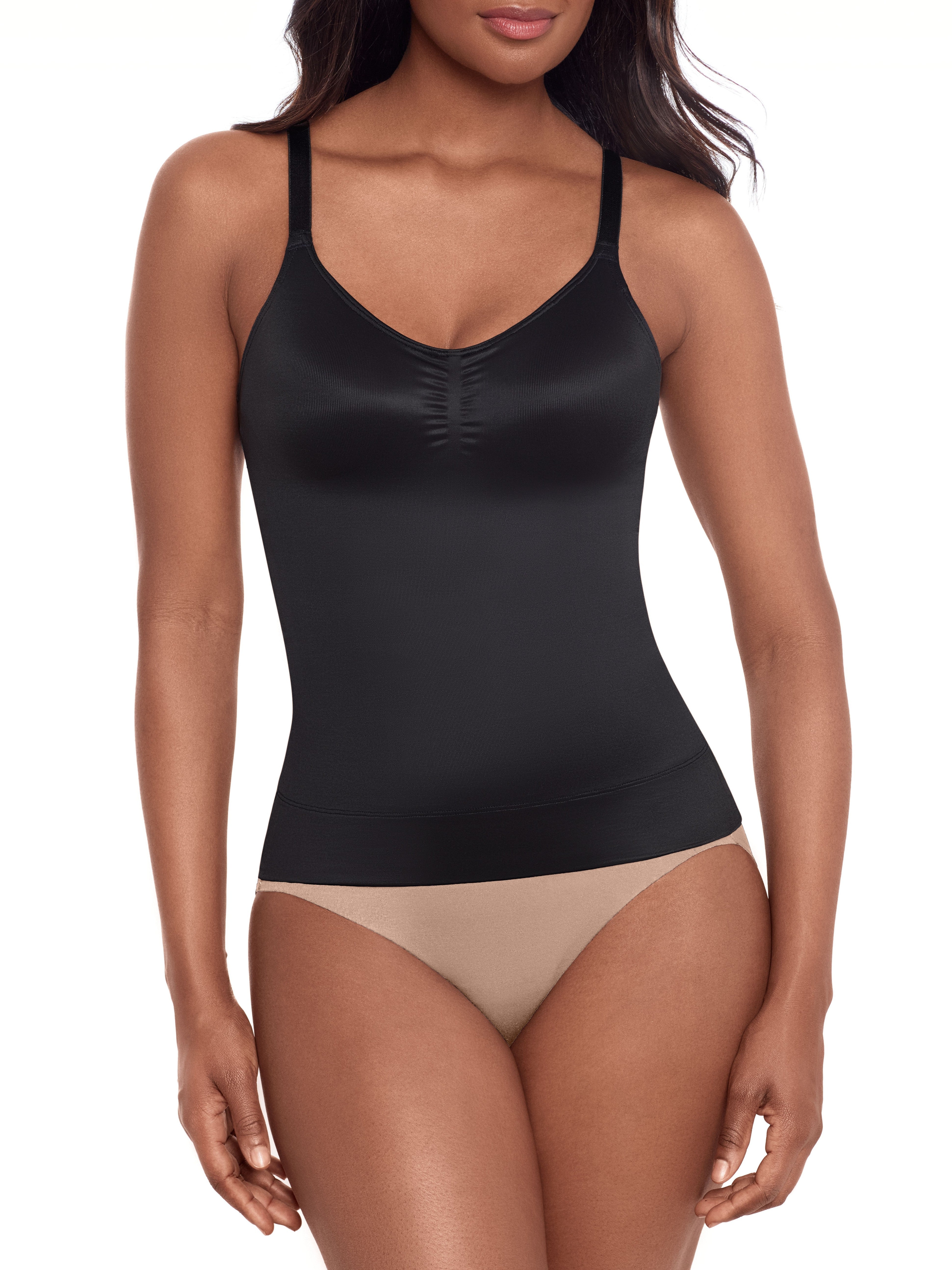 a woman wearing a black tummy control shaping cami shapewear