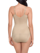 a woman wearing a nude tummy control shaping cami shapewear