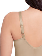 a close up of straps of a a woman wearing a nude tummy control shaping cami shapewear