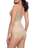 a woman wearing a nude tummy control shaping cami shapewear