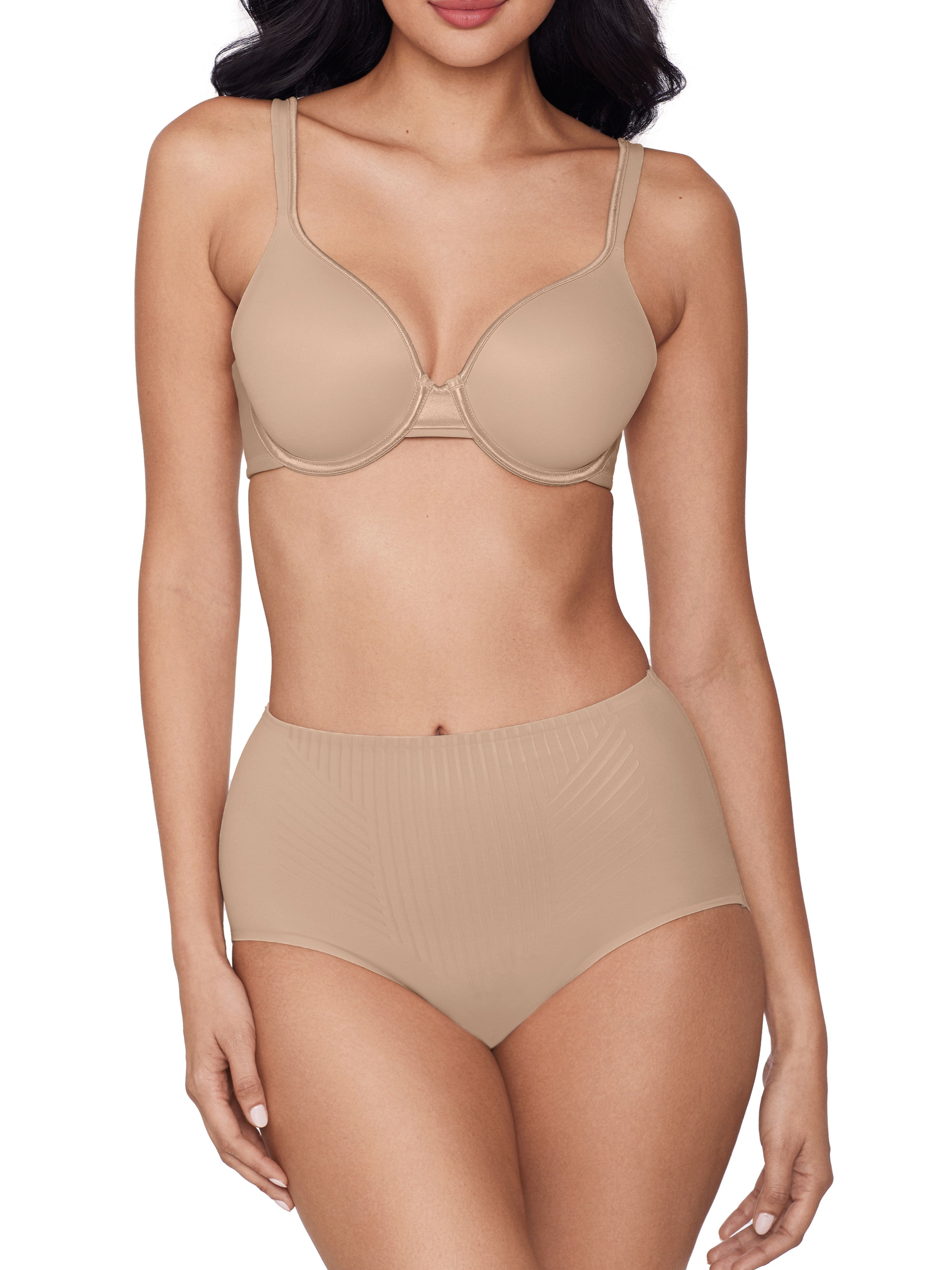 a woman wearing beige tummy control underwear shapewear all-groups
