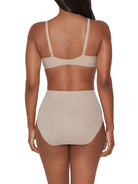 a woman wearing a beige shaping brief shapewear all-groups