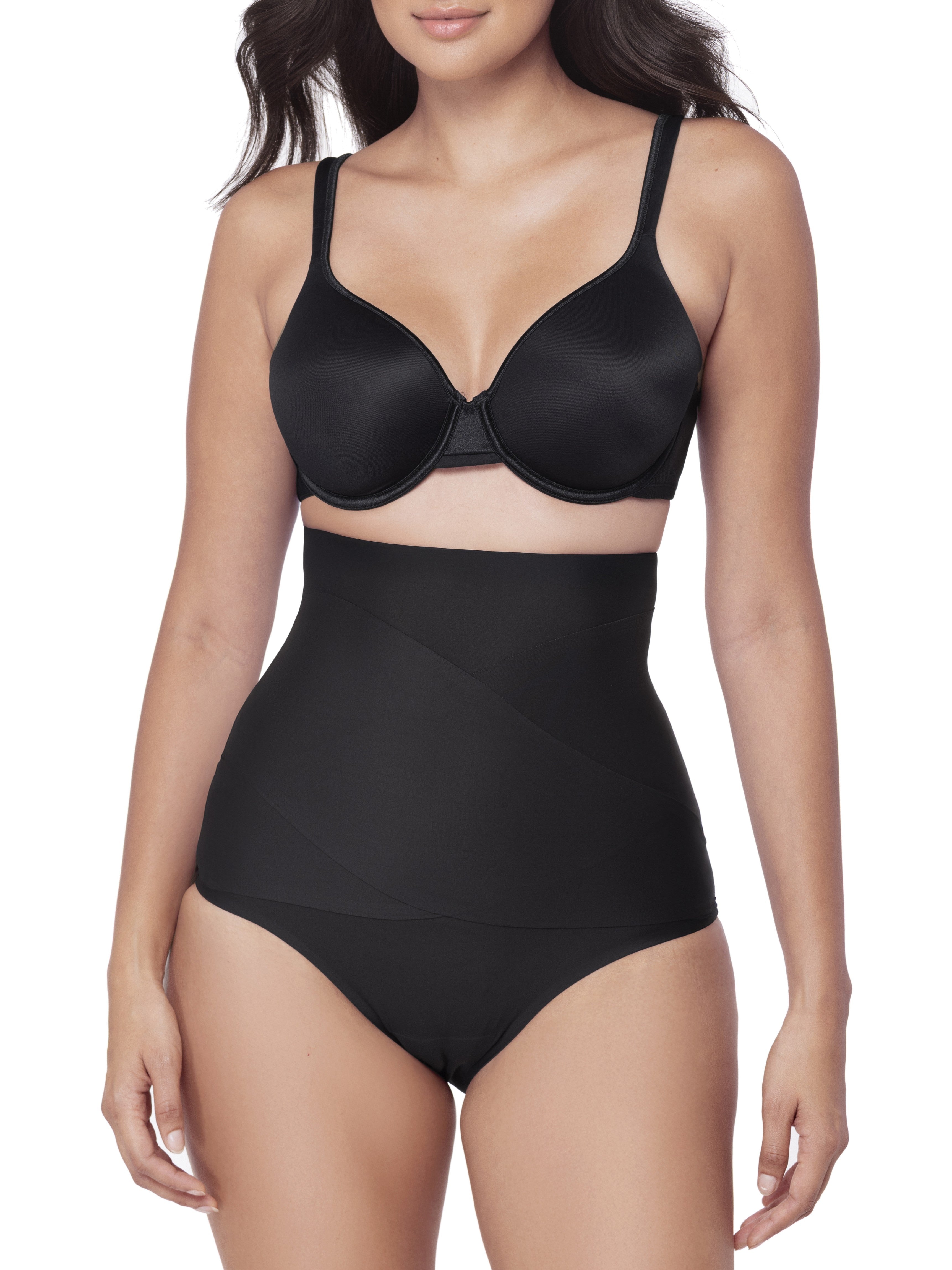 Woman wearing a black shapewear brief on a white background
