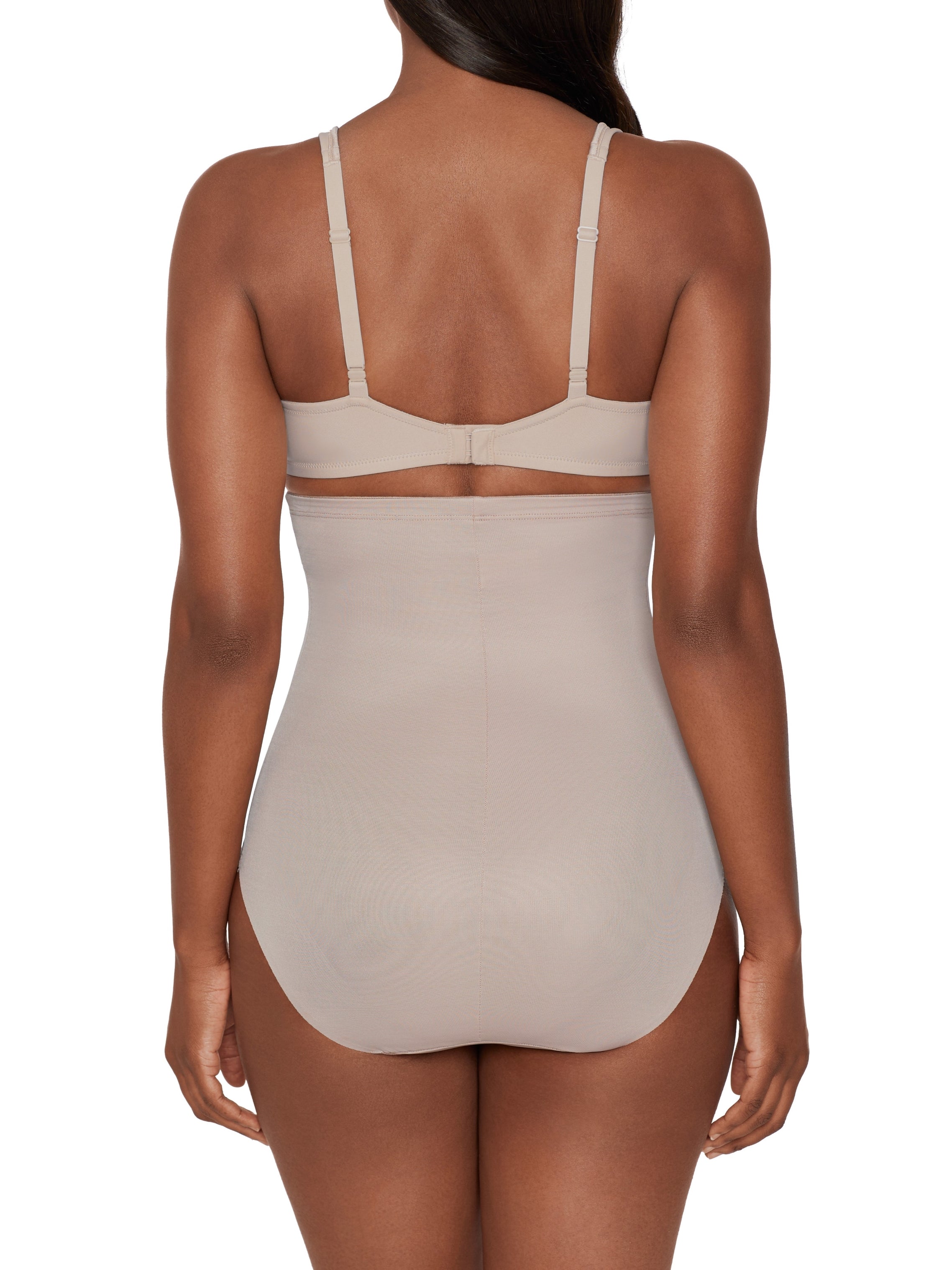 a woman wearing beige high waisted tummy control underwear