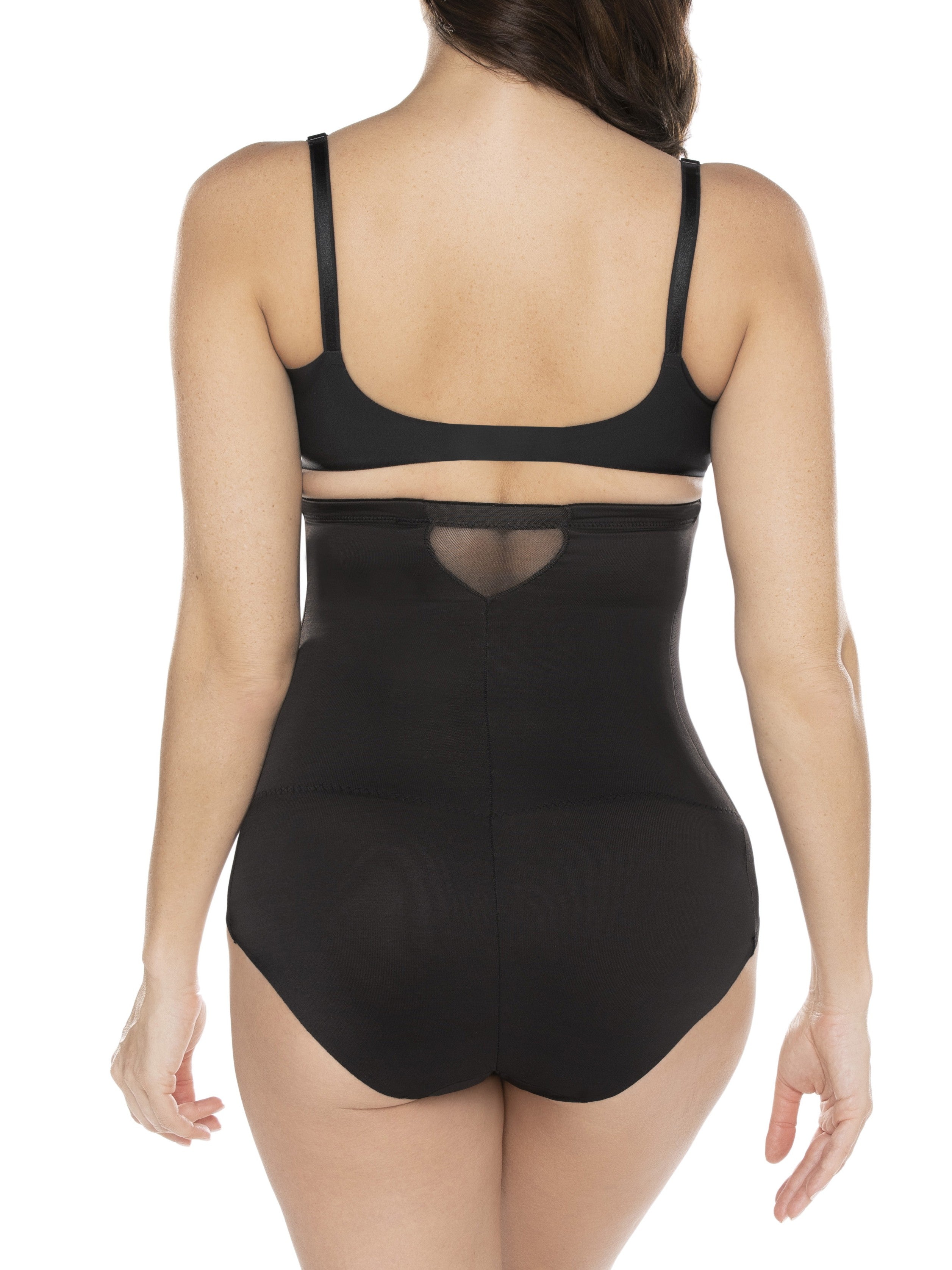 a woman wearing black high waisted tummy control underwear sheer shapewear