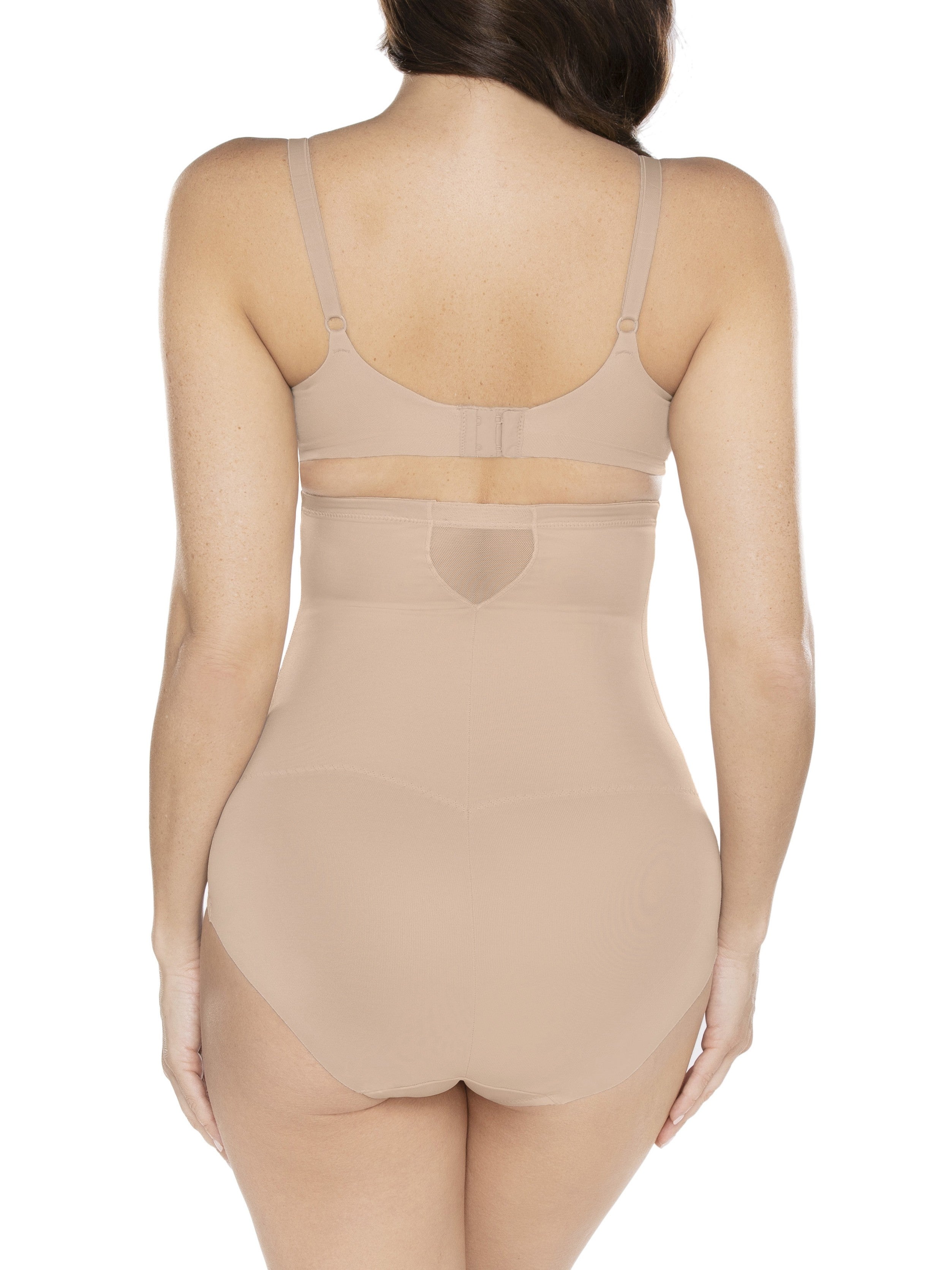 a woman wearing nude high waisted tummy control underwear sheer shapewear