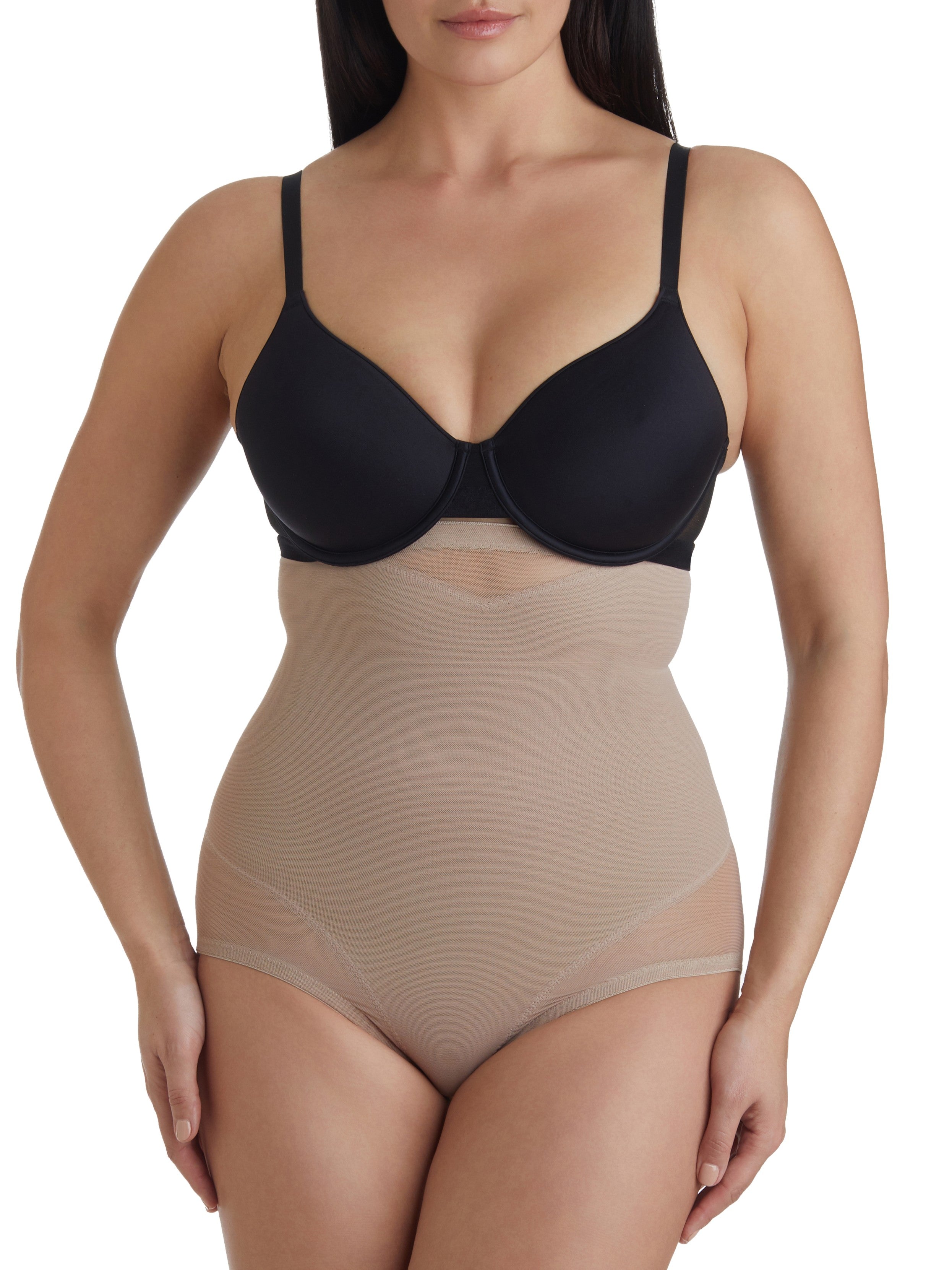 a woman wearing nude high waisted tummy control underwear sheer shapewear