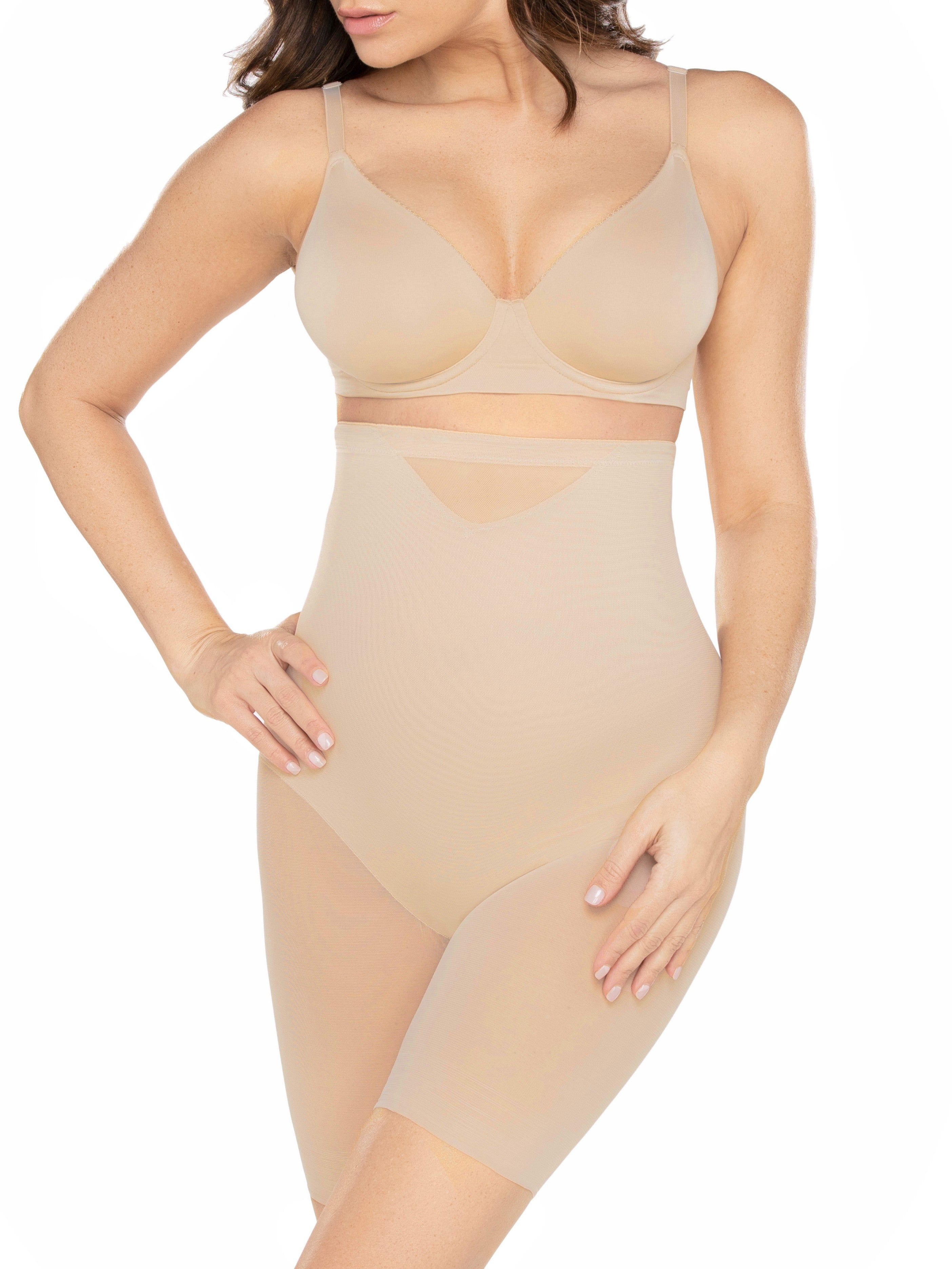 a woman wearing a nude high waisted sheer shapewear short body shaper