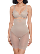 a woman wearing a nude high waisted sheer shapewear short body shaper
