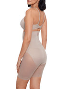 a woman wearing a nude high waisted sheer shapewear short body shaper