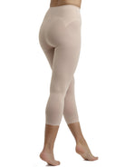 a woman wearing nude tummy control leggings shapewear