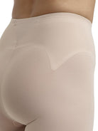 a close-up detail of a woman wearing nude tummy control leggings shapewear