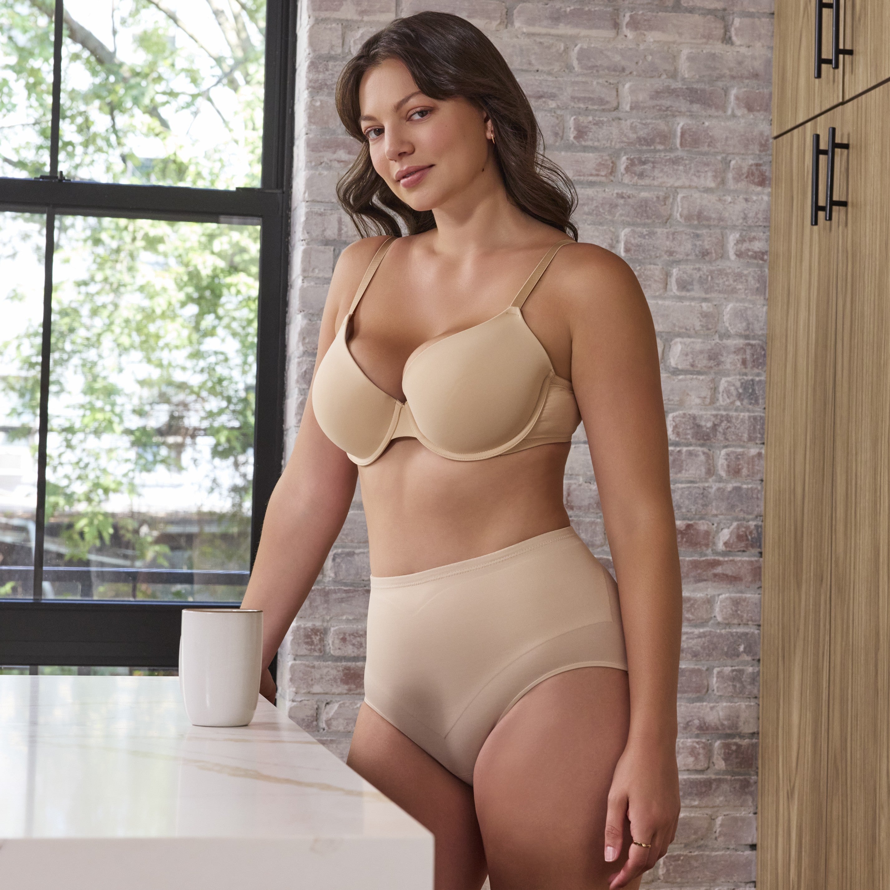 woman wearing a nude bra and a nude shaping brief all-groups