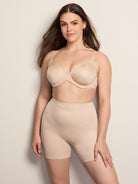 a woman wearing a nude tummy control shapewear short