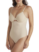 a woman wearing a nude tummy control underwear thong