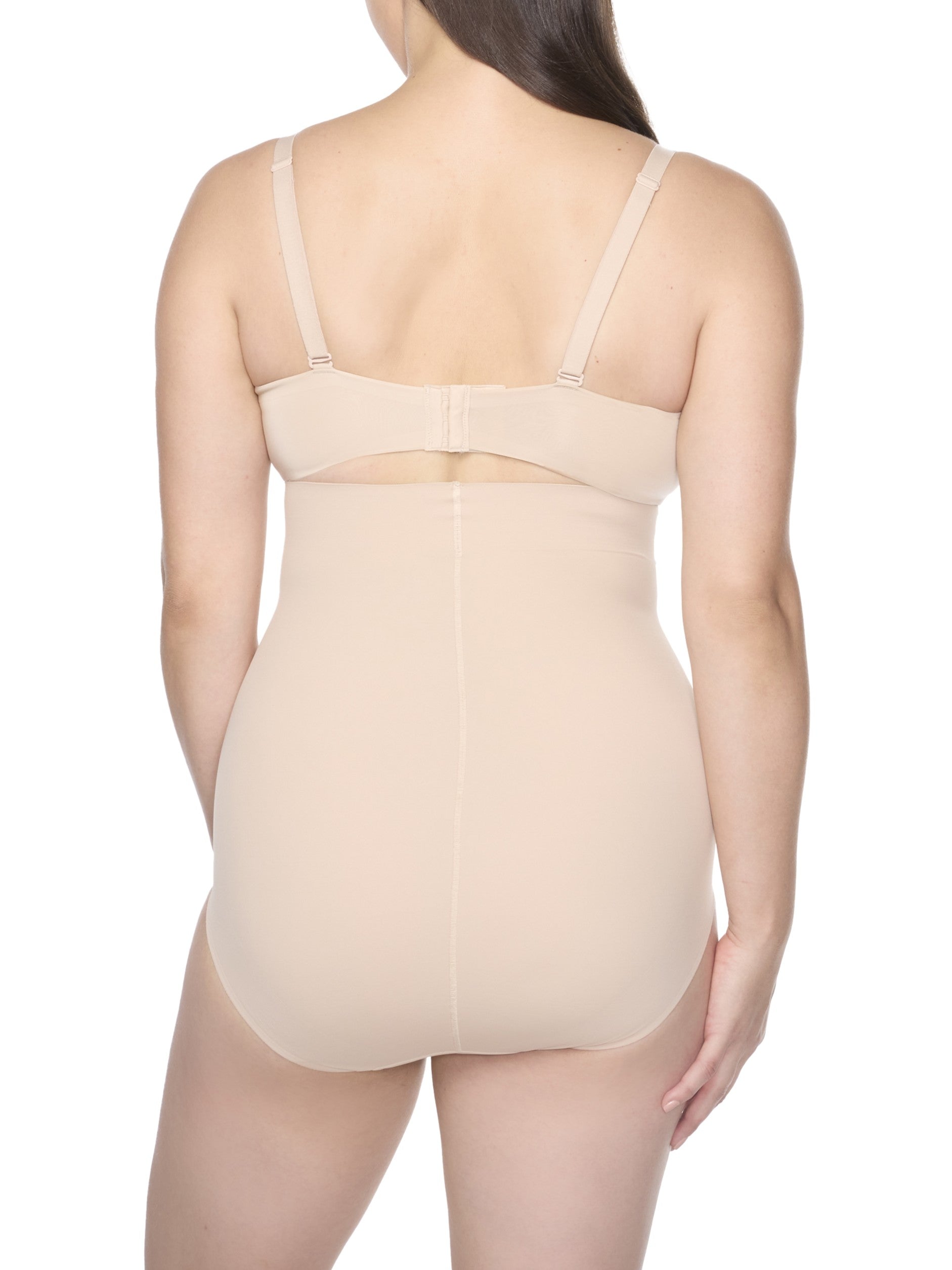 a woman wearing a beige high-waist shaping brief