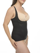 woman wearing a black open bust camisole with a beige bra