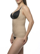 woman wearing a beige open bust camisole with a beige bra