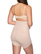 a woman wearing a nude high-waisted slanted hem short body shaper