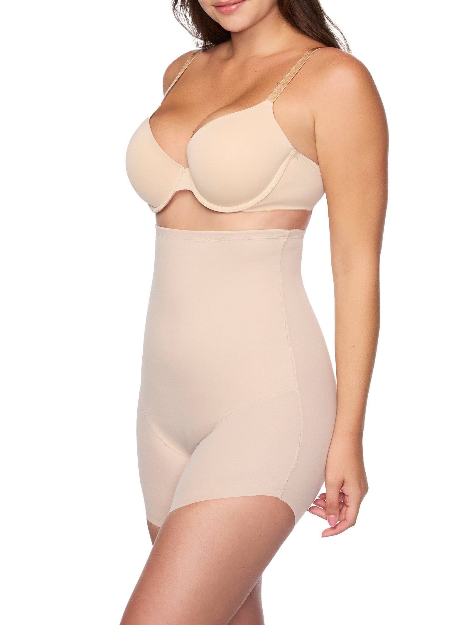 a woman wearing a nude high-waisted slanted hem short body shaper