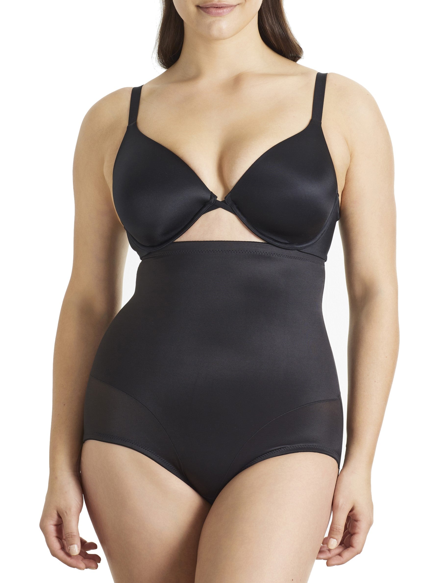 a woman wearing black high waisted tummy control underwear shapewear