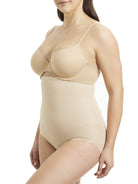 a woman wearing nude high waisted tummy control underwear shapewear
